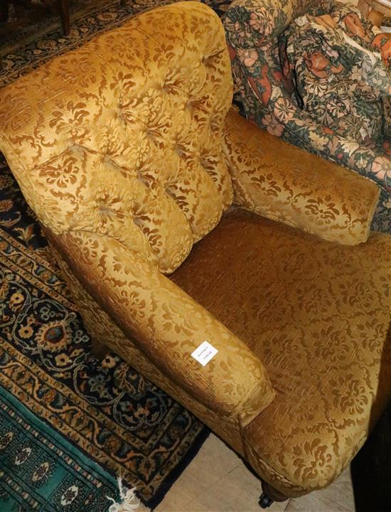 Edwardian gold upholstered low armchair